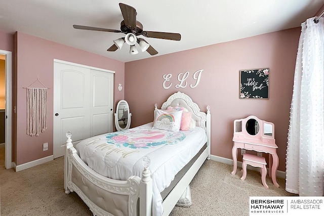18914 C St, Omaha, NE 68130 - bedroom with light carpet, a closet, baseboards, and a ceiling fan
