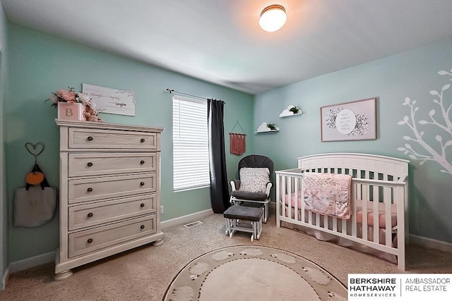18914 C St, Omaha, NE 68130 - bedroom with baseboards, a nursery area, and light colored carpet