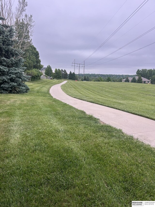18914 C St, Omaha, NE 68130 - surrounding community with a lawn