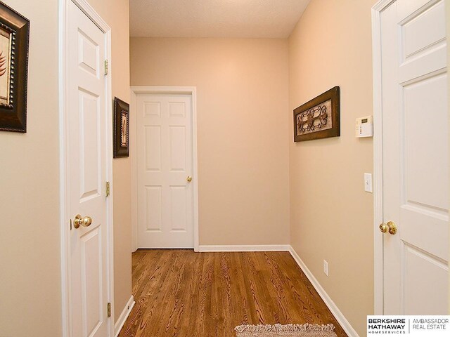5103 N 140th St, Omaha, NE 68164 - hall with wood finished floors and baseboards