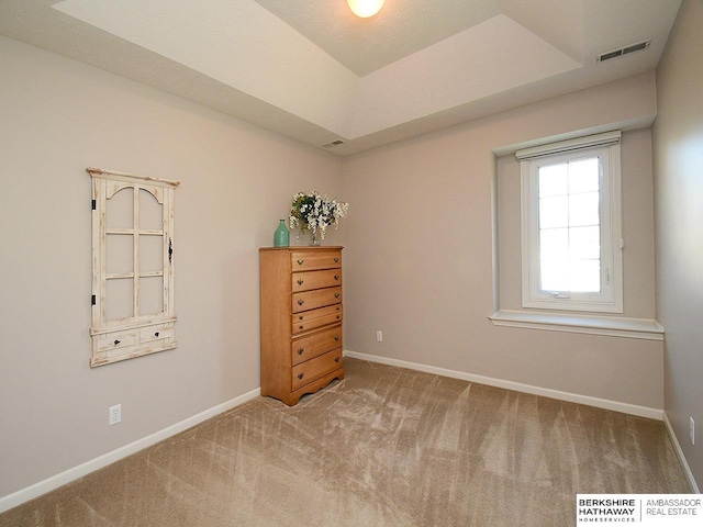5103 N 140th St, Omaha, NE 68164 - carpeted empty room featuring baseboards and a tray ceiling
