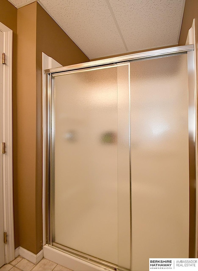 5103 N 140th St, Omaha, NE 68164 - bathroom featuring a stall shower and tile patterned flooring