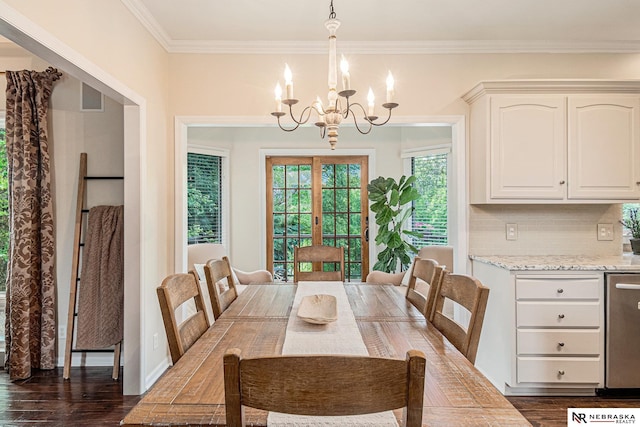 2221 S 181st Cir, Omaha, NE 68130 - dining room with a chandelier, dark wood finished floors, and crown molding
