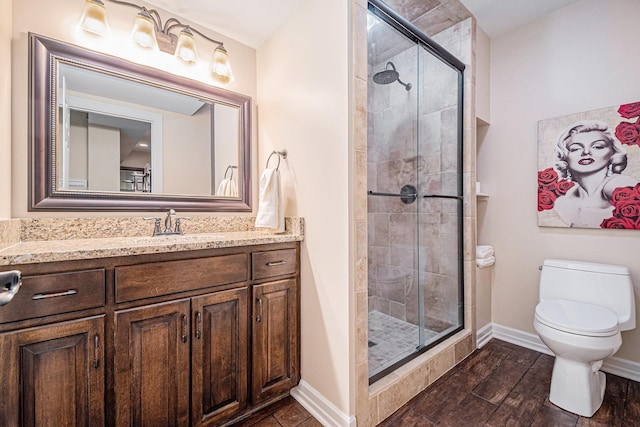 2221 S 181st Cir, Omaha, NE 68130 - full bath featuring vanity, a shower stall, and wood finished floors