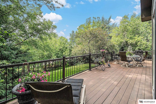 2221 S 181st Cir, Omaha, NE 68130 - wooden terrace featuring outdoor dining space and a lawn