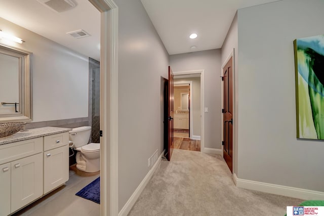 6602 Pheasant Run Pl, Lincoln, NE 68516 - hallway with light carpet, baseboards, and recessed lighting