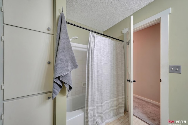 430 N 86th St, Lincoln, NE 68505 - bathroom with shower / tub combo and a textured ceiling