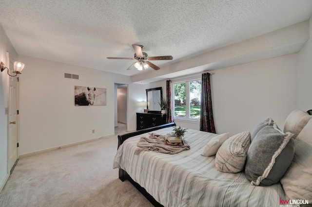 430 N 86th St, Lincoln, NE 68505 - carpeted bedroom with a textured ceiling, a ceiling fan, and baseboards