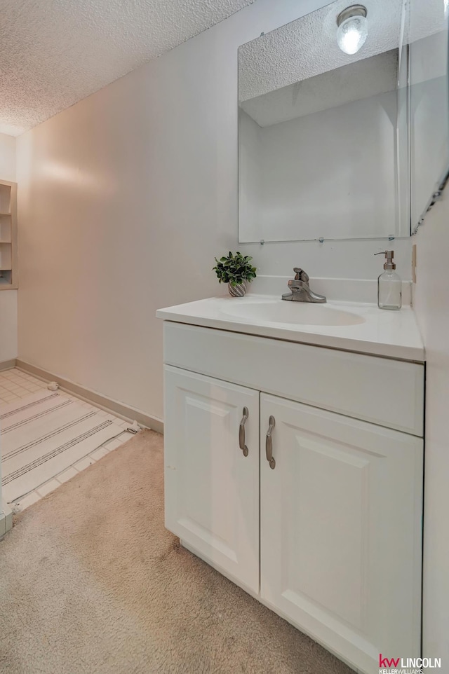 430 N 86th St, Lincoln, NE 68505 - bathroom with a textured ceiling and vanity