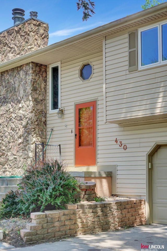 430 N 86th St, Lincoln, NE 68505 - property entrance featuring a garage