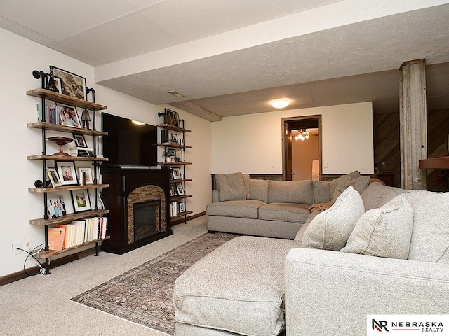 4219 Browning St, Lincoln, NE 68516 - living room featuring carpet flooring, a glass covered fireplace, and baseboards