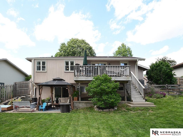 4219 Browning St, Lincoln, NE 68516 - rear view of house with stairway, a gazebo, an outdoor hangout area, a deck, and a patio