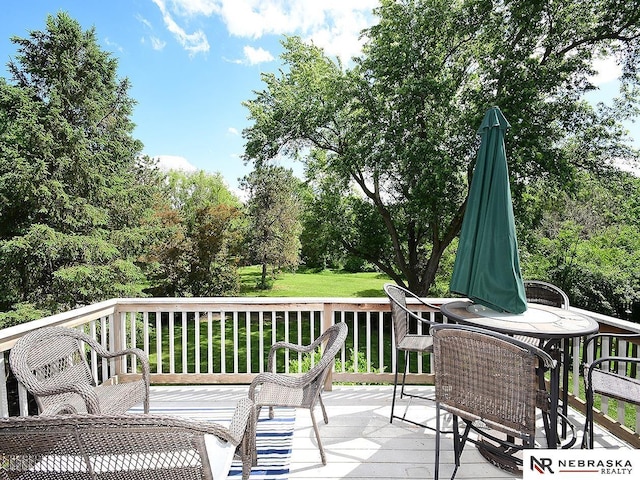 4219 Browning St, Lincoln, NE 68516 - wooden deck featuring view of scattered trees