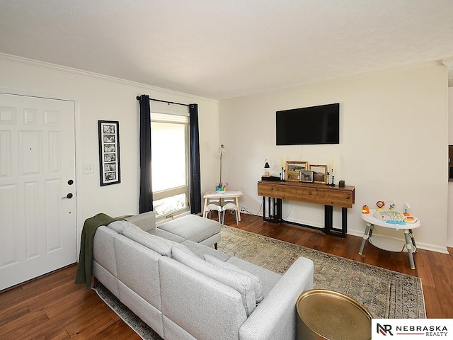 4219 Browning St, Lincoln, NE 68516 - living room with wood finished floors, ornamental molding, and baseboards