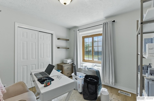 4019 N 147th St, Omaha, NE 68116 - office space with light wood finished floors, a textured ceiling, and baseboards
