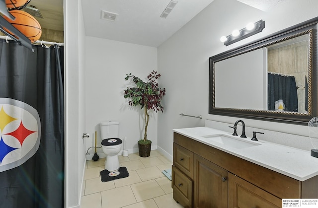 4019 N 147th St, Omaha, NE 68116 - bathroom featuring vanity, tile patterned floors, toilet, curtained shower, and baseboards
