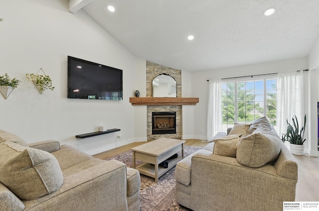 4019 N 147th St, Omaha, NE 68116 - living room featuring wood finished floors, recessed lighting, a large fireplace, and baseboards
