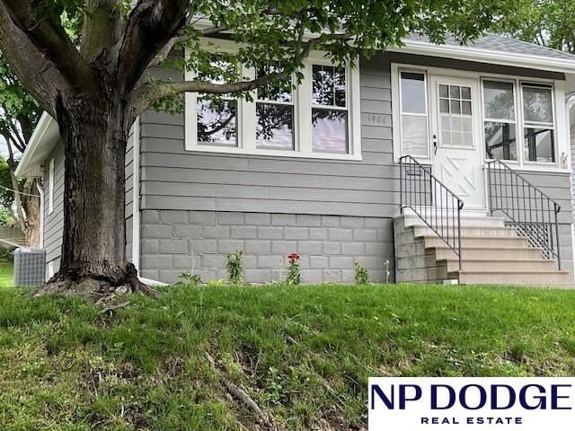 1406 S 55th St, Omaha, NE 68106 - view of front of home with central air condition unit