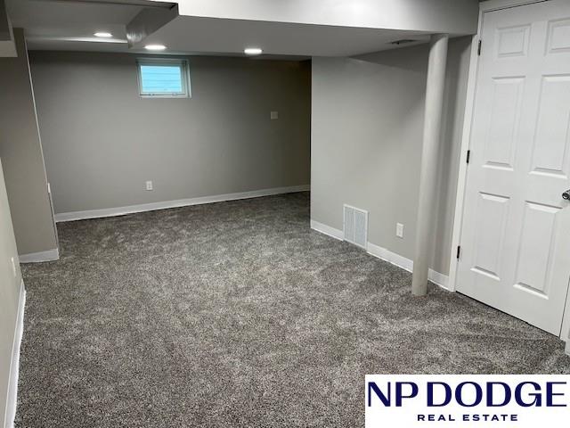 1406 S 55th St, Omaha, NE 68106 - basement featuring carpet flooring, baseboards, and recessed lighting