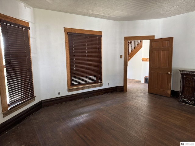 204 E York Ave, Dewitt, NE 68341 - spare room featuring wood finished floors and baseboards
