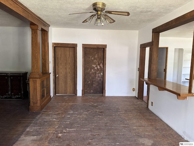 204 E York Ave, Dewitt, NE 68341 - unfurnished room featuring a ceiling fan, wood finished floors, and a textured ceiling