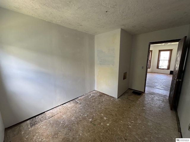 204 E York Ave, Dewitt, NE 68341 - unfurnished room with a textured ceiling