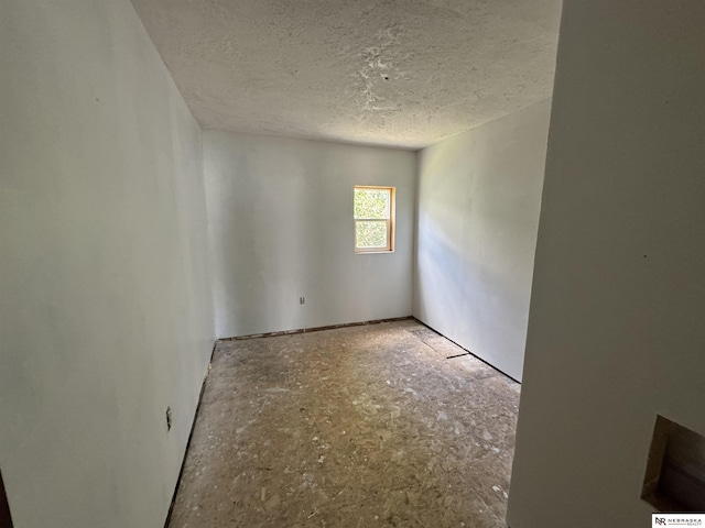204 E York Ave, Dewitt, NE 68341 - empty room featuring a textured ceiling