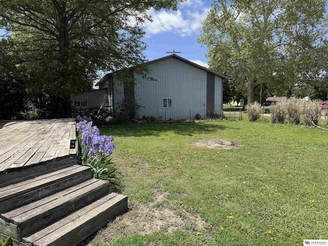 204 E York Ave, Dewitt, NE 68341 - view of grassy yard with a wooden deck