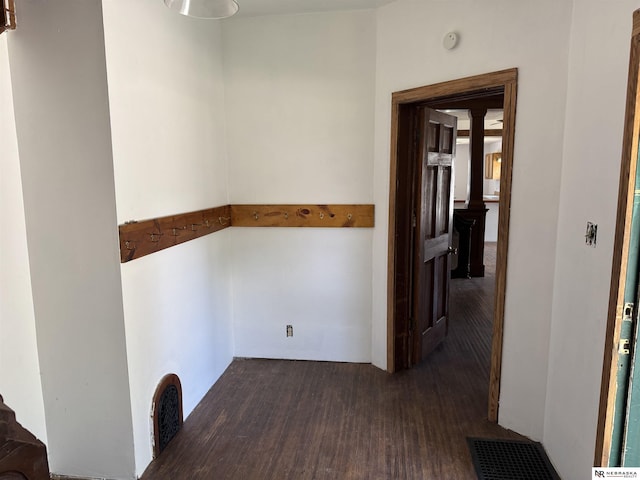 204 E York Ave, Dewitt, NE 68341 - corridor featuring dark wood-style floors and decorative columns