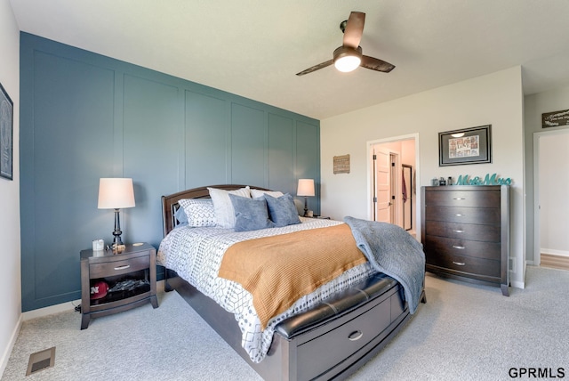 18403 Greenleaf St, Omaha, NE 68136 - bedroom with light colored carpet, a decorative wall, baseboards, and a ceiling fan