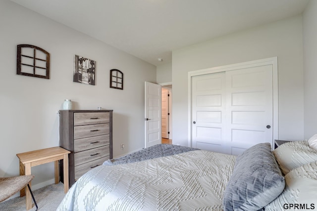 18403 Greenleaf St, Omaha, NE 68136 - bedroom with light carpet, a closet, and baseboards