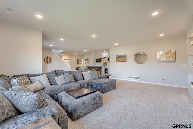 18403 Greenleaf St, Omaha, NE 68136 - living area with carpet flooring, recessed lighting, baseboards, bar area, and stairs