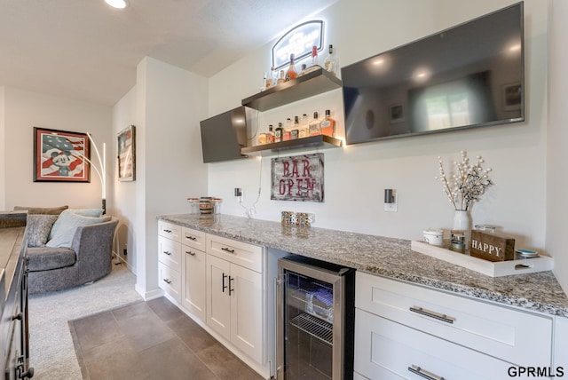 18403 Greenleaf St, Omaha, NE 68136 - indoor dry bar featuring beverage cooler and dark colored carpet