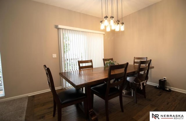 10425 S 110th St, Papillion, NE 68046 - dining space featuring a chandelier, baseboards, and dark wood-type flooring