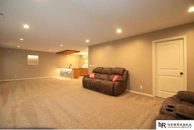 10425 S 110th St, Papillion, NE 68046 - living room featuring wet bar, light carpet, recessed lighting, and baseboards