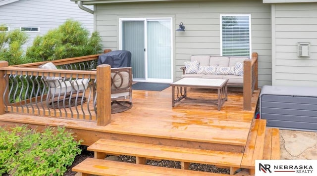 10425 S 110th St, Papillion, NE 68046 - wooden terrace with outdoor lounge area and area for grilling