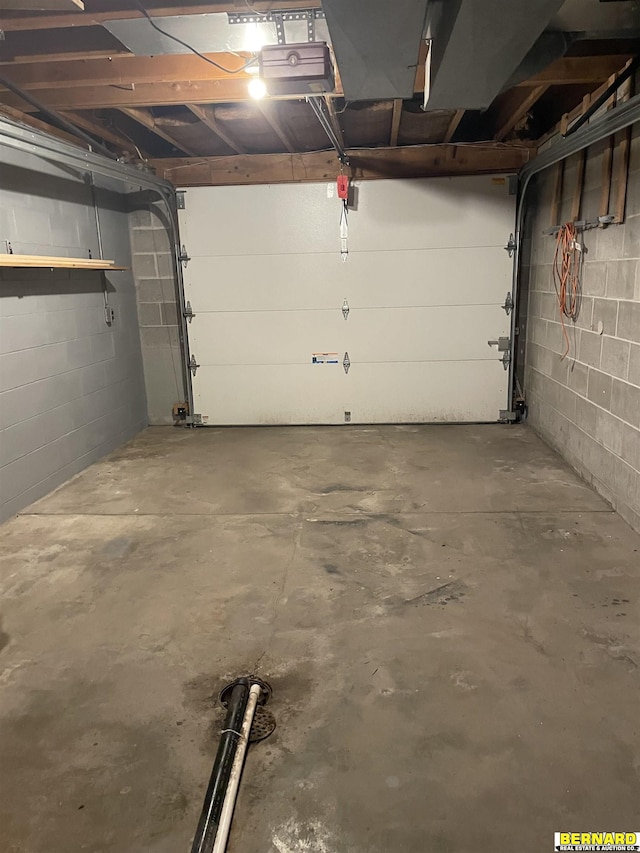 608 N 16th St, Nebraska City, NE 68410 - garage with concrete block wall and a garage door opener