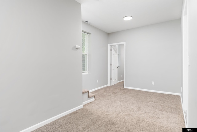 1204 S 27th St, Omaha, NE 68105 - empty room featuring carpet and baseboards