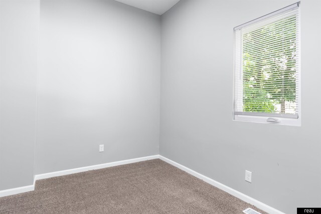 1204 S 27th St, Omaha, NE 68105 - carpeted spare room with baseboards
