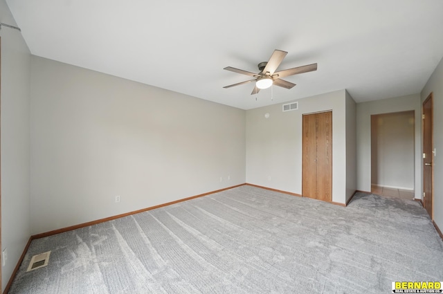 5665 I Rd, Nebraska City, NE 68410 - unfurnished bedroom featuring baseboards, light colored carpet, and a closet