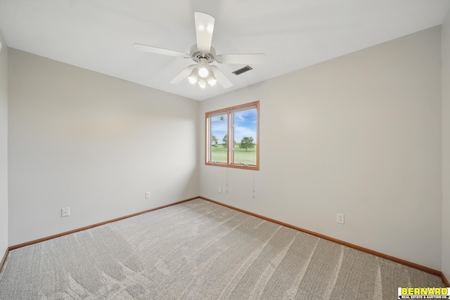 5665 I Rd, Nebraska City, NE 68410 - empty room with light carpet, baseboards, and a ceiling fan