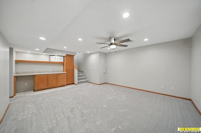 5665 I Rd, Nebraska City, NE 68410 - unfurnished living room featuring recessed lighting, light colored carpet, baseboards, a ceiling fan, and stairs