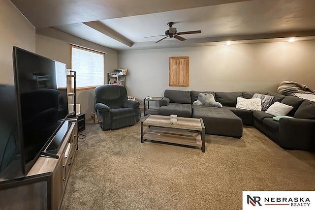 21204 Hampton Dr, Gretna, NE 68028 - living room with carpet flooring, a ceiling fan, and a tray ceiling