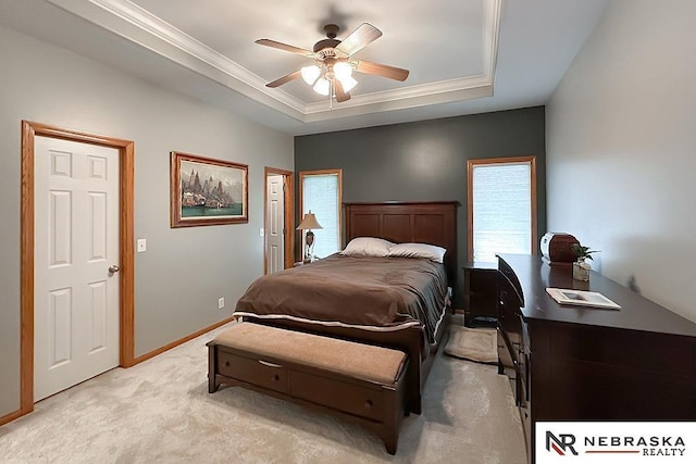 21204 Hampton Dr, Gretna, NE 68028 - bedroom with a tray ceiling, light colored carpet, crown molding, a ceiling fan, and baseboards