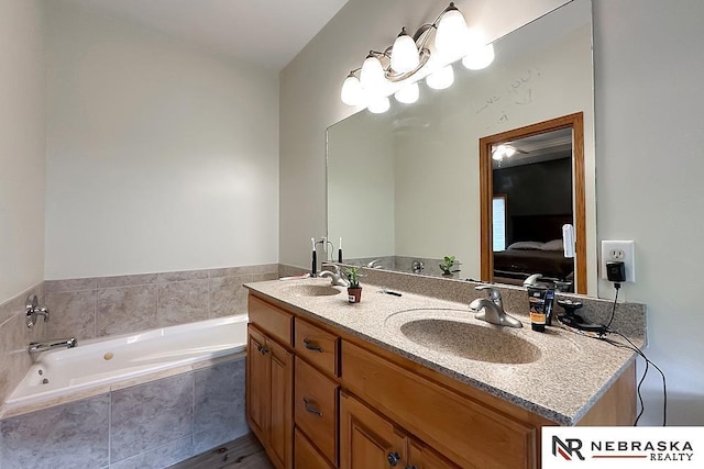 21204 Hampton Dr, Gretna, NE 68028 - bathroom featuring double vanity, a bath, and connected bathroom