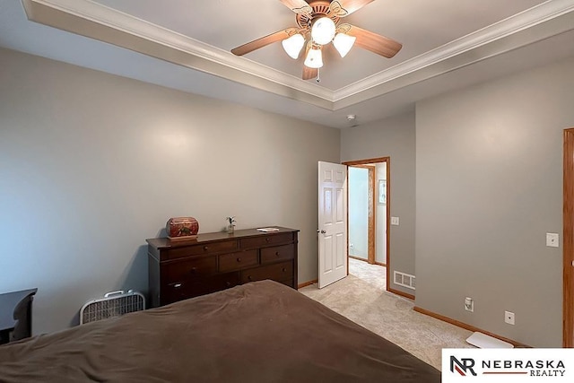 21204 Hampton Dr, Gretna, NE 68028 - bedroom featuring light carpet, a raised ceiling, baseboards, crown molding, and a ceiling fan
