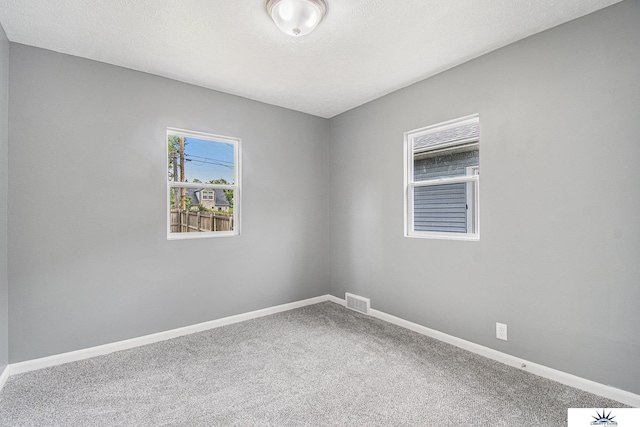 3810 Corby St, Omaha, NE 68111 - carpeted spare room with baseboards