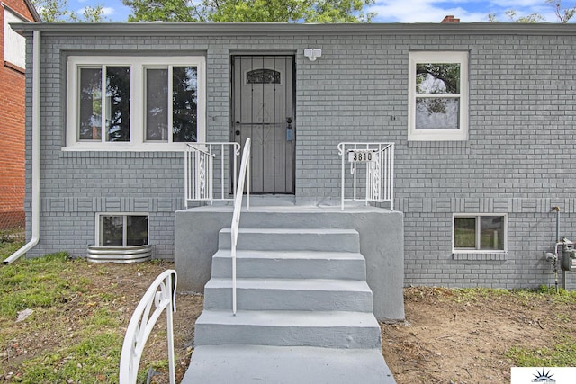 3810 Corby St, Omaha, NE 68111 - property entrance featuring brick siding