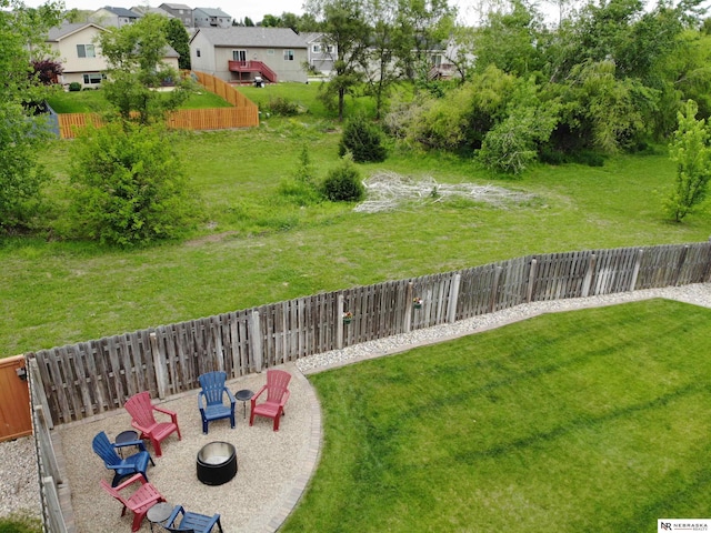 7316 N 142nd Ave, Omaha, NE 68142 - view of yard featuring an outdoor fire pit