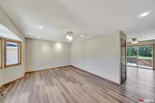 235 W Belmont Ave, Lincoln, NE 68521 - unfurnished room featuring baseboards, light wood-style floors, recessed lighting, and ceiling fan